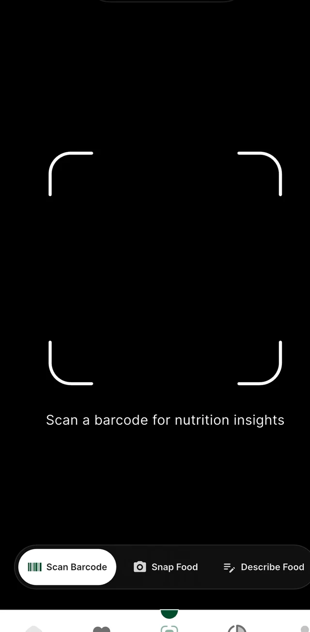 Guiltless scan screen with a camera frame and the text "Scan a barcode for nutrition insights," above three options: Scan Barcode, Snap Food and Describe Food.